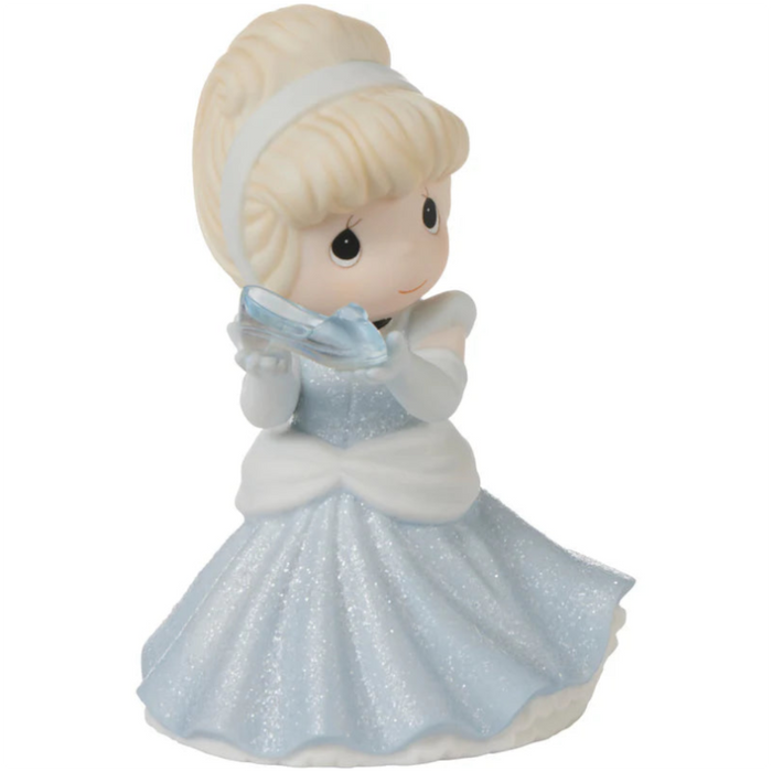 Cinderella holding her iconic glass slipper.