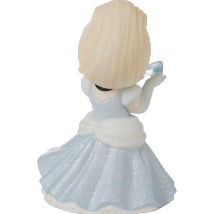 Cinderella holding her iconic glass slipper.