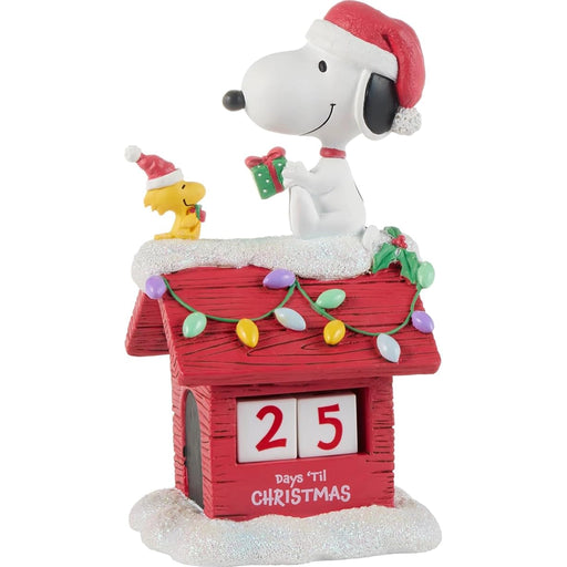 Side view of snoopy on his house figurine