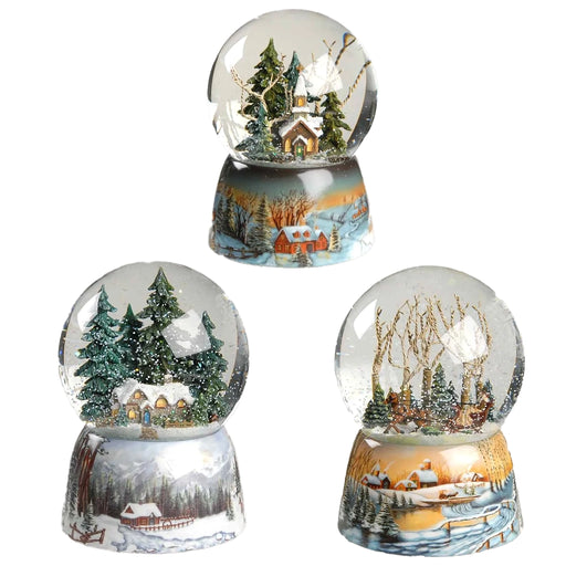 wind-up musical glitter dome featuring a charming winter scene surrounded by sparkling swirling glitter.
