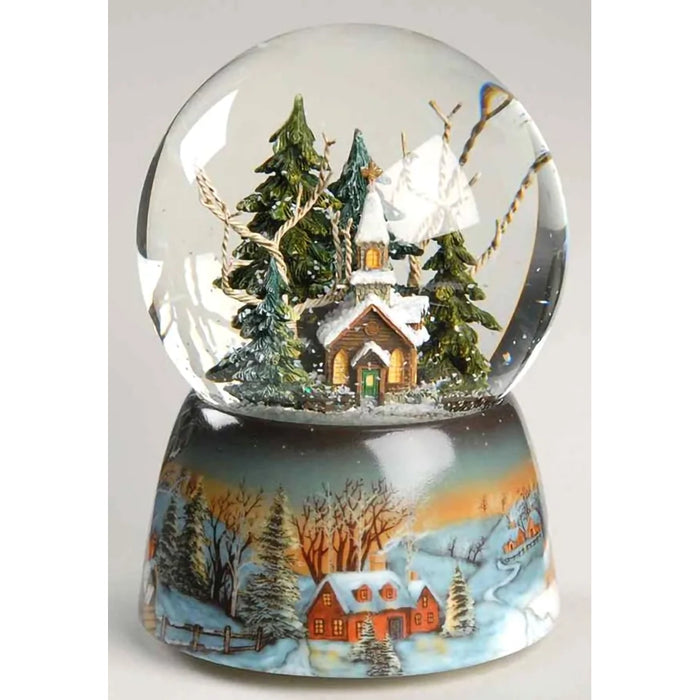 wind-up musical glitter dome featuring a charming winter scene surrounded by sparkling swirling glitter.