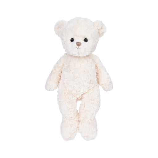 A white teddy bear with black eyes, sitting upright and looking friendly.