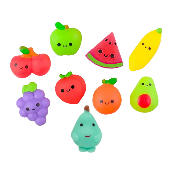 Set of colorful fruit-shaped toys with smiling faces on a white background