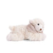 A stuffed animal featuring a white face and brown eyes, showcasing a soft and cuddly appearance.