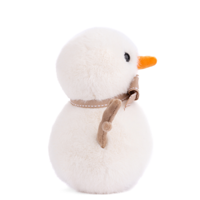 White plush duck with a brown bow tie on a white background
