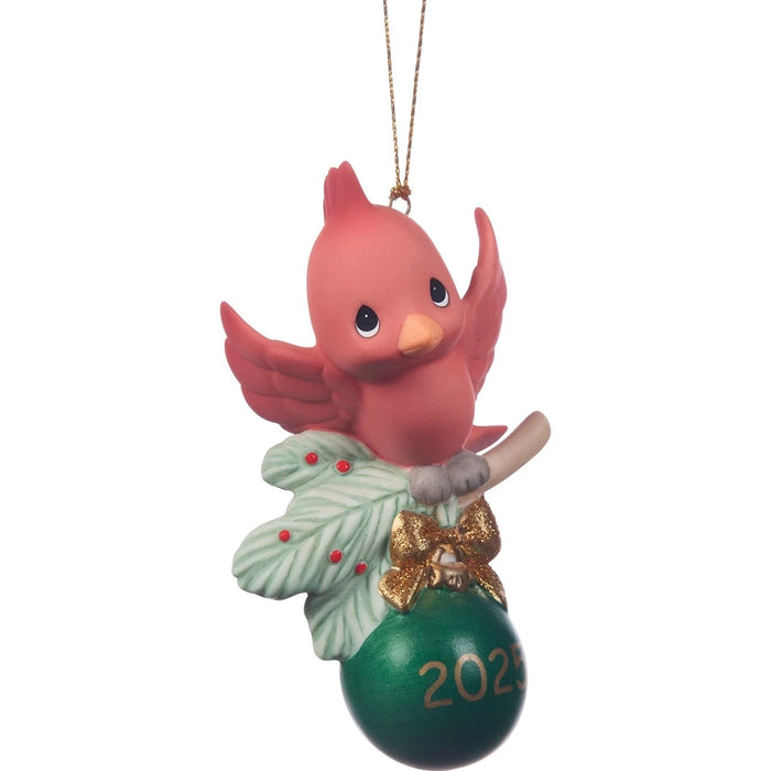 Decorative Christmas ornament with a cardinal bird on a green ball, featuring the number '2022'.