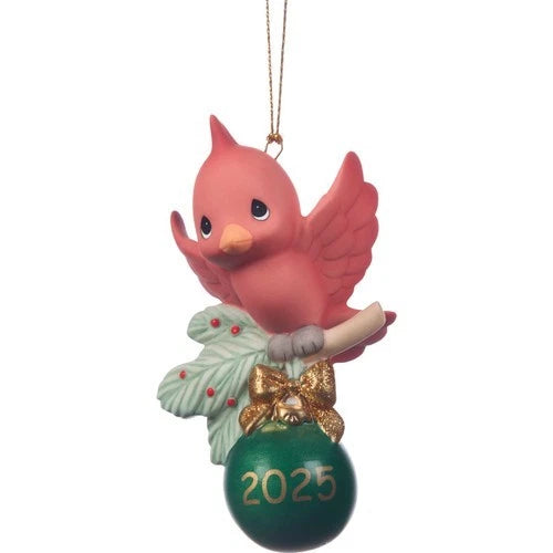 Cardinal bird ornament with a green ball and '2025' on a white background