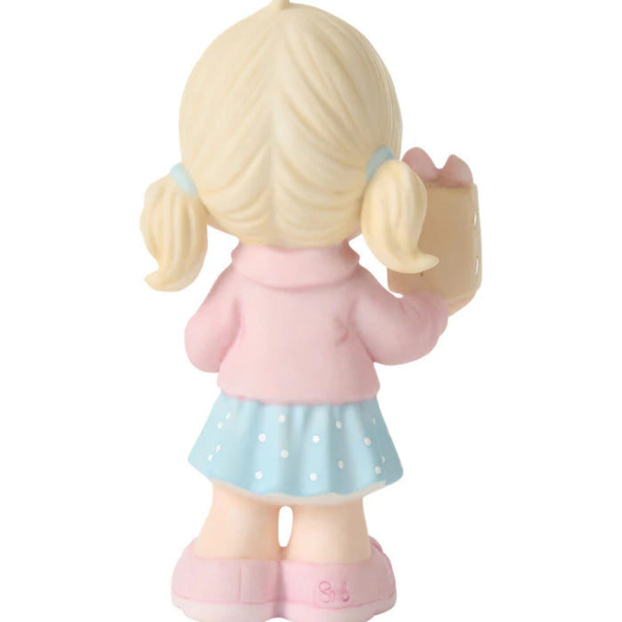Featuring a charming young girl with pigtails, dressed in a pink jacket and polka-dot skirt, with handmade gift bag labeled Mom.
