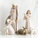 Nativity scene figurines with Mary, Joseph, and baby Jesus on a white background