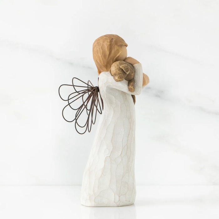 Decorative figurine of a woman holding a child with a measurement label on a white background