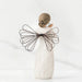 A serene angel made of willow branches, cradling a heart, representing love and tranquility in nature.
