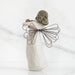angel figurine with wire wings on a white background