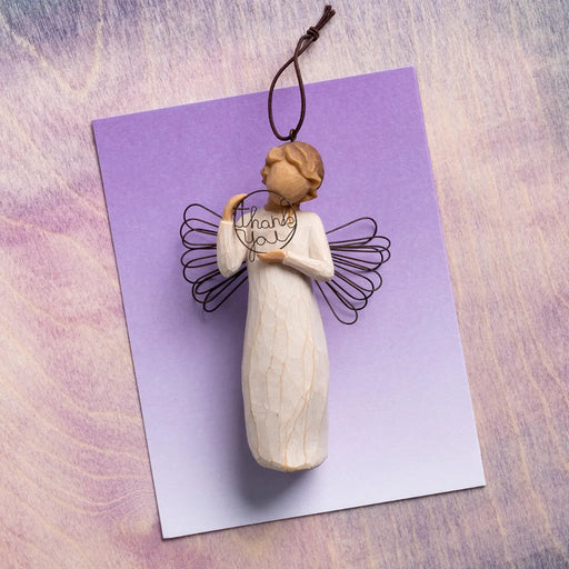 Willow Tree Thank you angel  ornament on a purple  background 