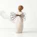 Decorative angel figurine with a wire bow on a white background