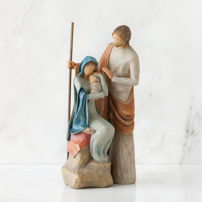 nativity scene figurine with Mary, Joseph, and baby Jesus on a white background