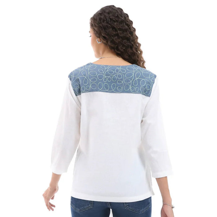 Designed with a flattering silhouette and versatile appeal, this chic top transitions seamlessly from casual daytime outings to evening gatherings. 