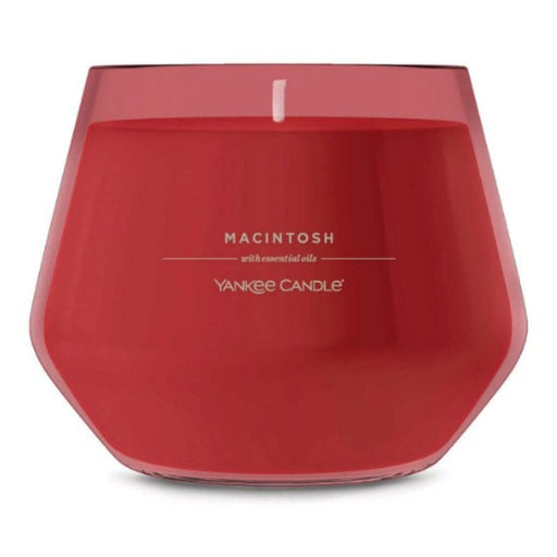  Macintosh scented Red candle with 'Yankee Candle' branding on a white background