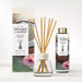 Yankee Candle Coconut Beach reed diffuser set including a glass bottle with a gold cap, natural reed sticks, and the branded retail box on a clean white background.