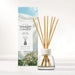 Yankee Candle Clean Cotton reed diffuser set with a clear glass bottle, white cap, natural wood reeds, and the matching product box featuring white cotton imagery.