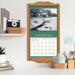 Calendar with January 2026 on a desk with decorative items