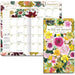Floral planner with a monthly calendar layout and 'Wild at Heart' design on a white background.