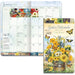 2026-2027 Lang Garden Botanicals planner with calendar and cover featuring flowers and butterflies.