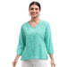 Featuring a soft seafoam hue and a flattering silhouette, this top is perfect for casual outings, weekend brunches, or layering under your favorite jacket.
