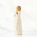 Decorative figurine with intricate patterns on a white background