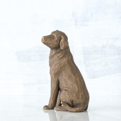 Brown dog statue on a white background