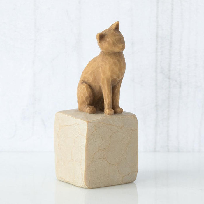 Cat-shaped figurine on a white background
