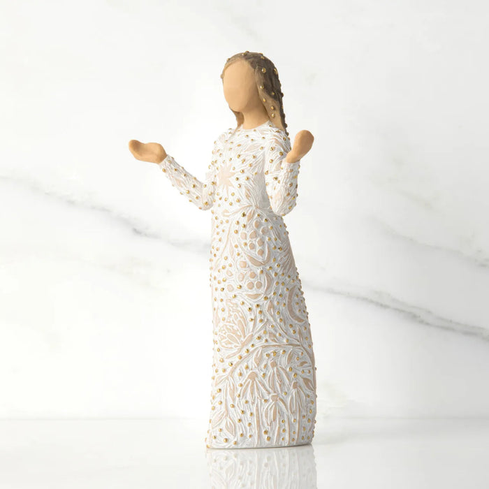 Statue of a woman in a white dress with a textured pattern on a light gray background