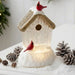 5.75-inch lighted water lantern featuring a cardinal bird house with swirling glitter