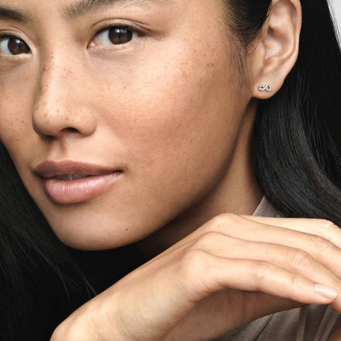 The ultimate symbol of eternal love, the infinity symbol features in these sparkling stud earrings.