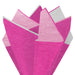 Detailed close‑up of pink gradient tissue assortment with bright, deep, and white tones