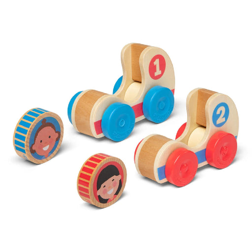 Three wooden toys featuring a child's face, showcasing playful designs and bright colors.