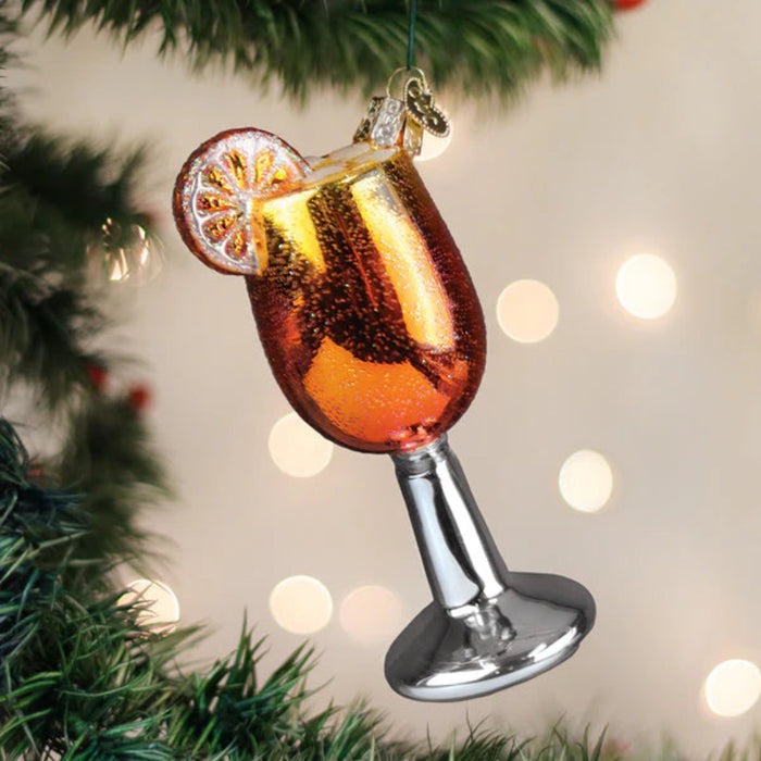 Whether you're decorating for the holidays or searching for the perfect gift for a cocktail enthusiast, this playful ornament is sure to stand out in any seasonal display.
