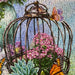 Jigsaw puzzle with a birdcage, flowers, and butterflies