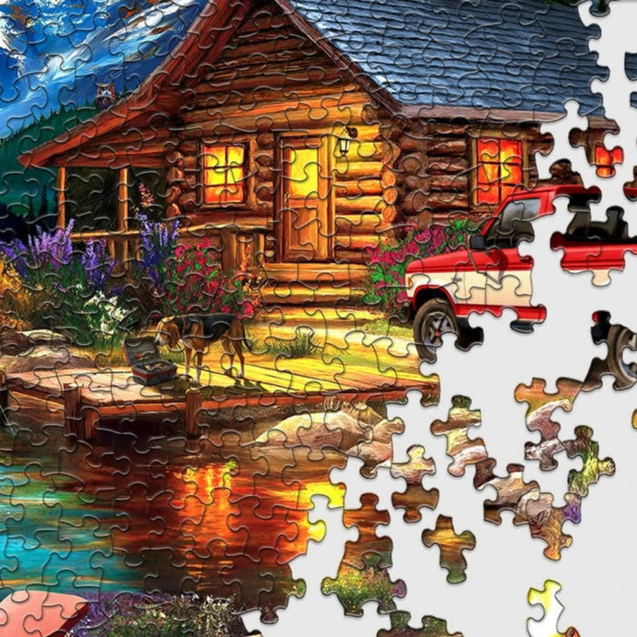 Jigsaw puzzle with a cabin scene, some pieces completed
