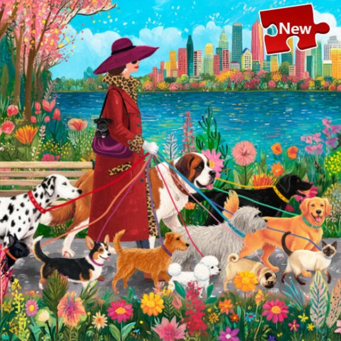 Springbok Fashionista Dog Walker 500-piece jigsaw puzzle featuring a stylish dog walker with dogs
