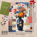 Springbok Quilted Flower Vase 500-piece jigsaw puzzle featuring colorful floral artwork