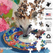 This Springbok Little Explorer 500 Piece Jigsaw Puzzle features a vibrant, detail-rich scene designed to delight puzzle lovers of all ages.