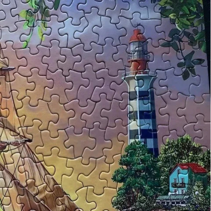 Jigsaw puzzle with a lighthouse and ship design
