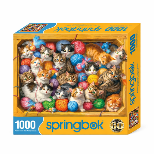 Springbok puzzle box with kittens and yarn balls on a white background
