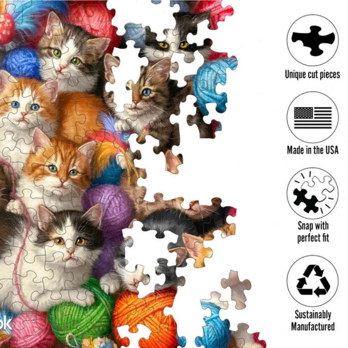 Jigsaw puzzle of cats with yarn balls, featuring Springbok branding and product features.