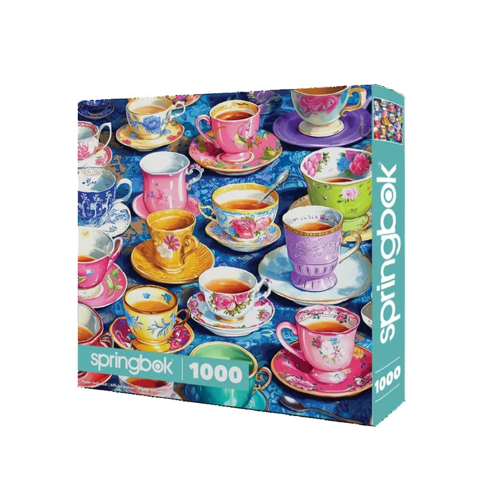 Jigsaw puzzle box featuring colorful teacups and saucers with 'Springbok' branding.