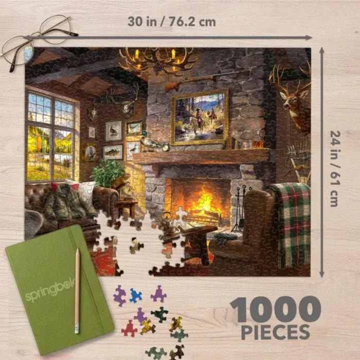 This Springbok Hunting Retreat 1000 Piece Jigsaw Puzzle captures a serene hunting lodge scene