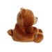 A soft brown teddy bear resting on a clean white surface.