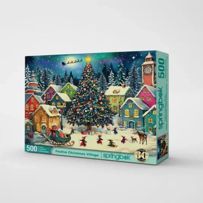 This Springbok Festive Christmas Village 500 Piece Jigsaw Puzzle captures a snow-dusted village alive with festive lights and holiday cheer.