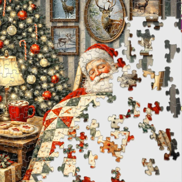 This Springbok Sleeping Santa 500 Piece Jigsaw Puzzle features a cozy scene of Santa catching some rest before his big night.