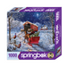 Springbok puzzle box with a winter scene featuring a covered wagon and horse.